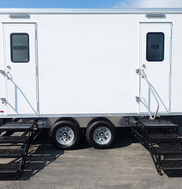Restroom trailer exterior with two stall entrances