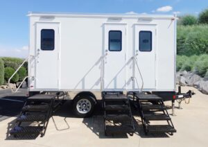 Exterior view of a three stall Lang Restroom Trailer