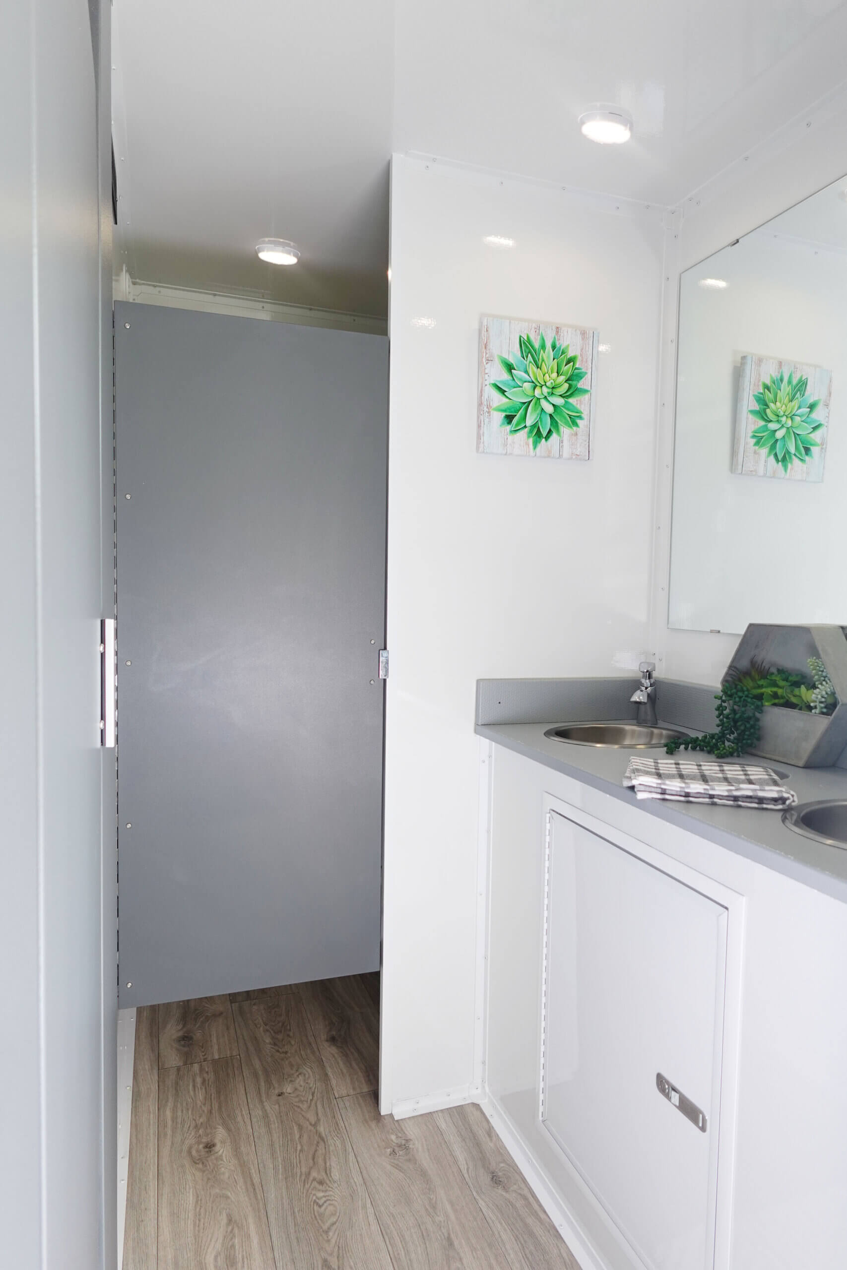luxury interior photo of five-stall restroom trailer