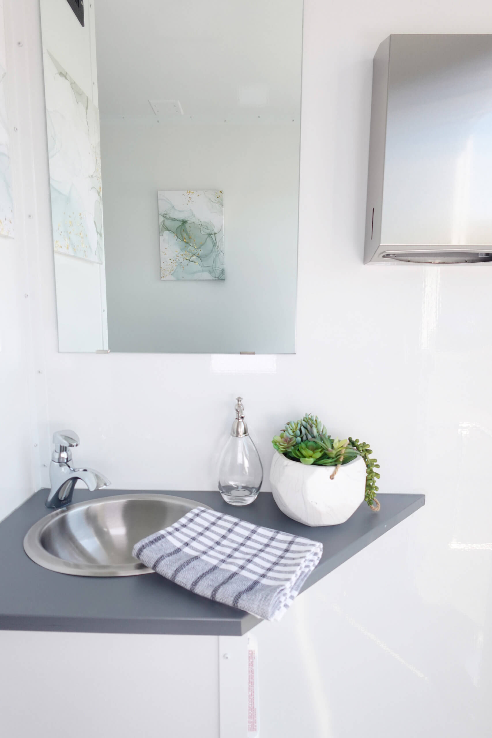 vanity sink inside a luxury restroom trailer in jacksonville, fl
